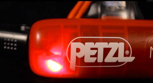 Petzl Nao+ Plus battery compartment red light activated.